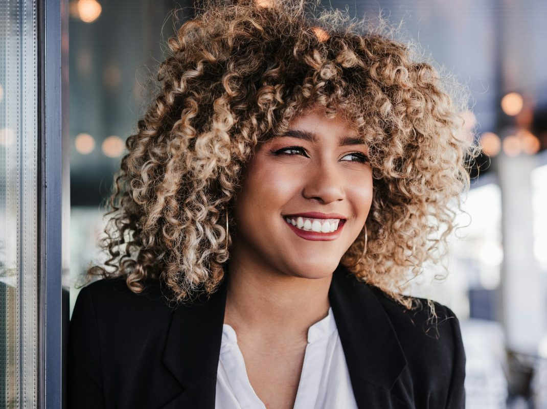 portrait of happy confident business woman in cafe. Business concept